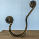 Set of six hammered Art Deco coat hooks