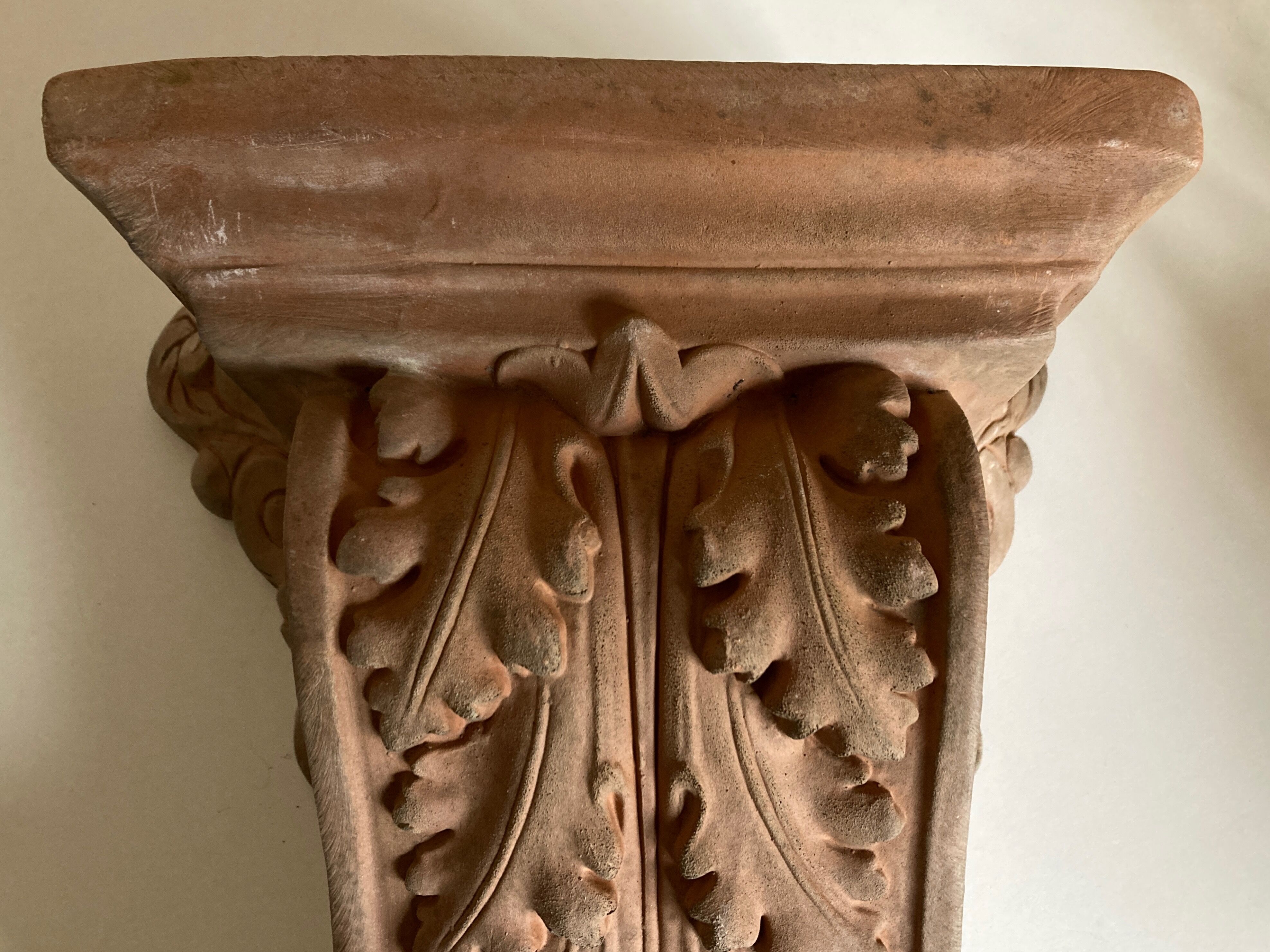 Neo classical console terracotta shelf acanthus leaves