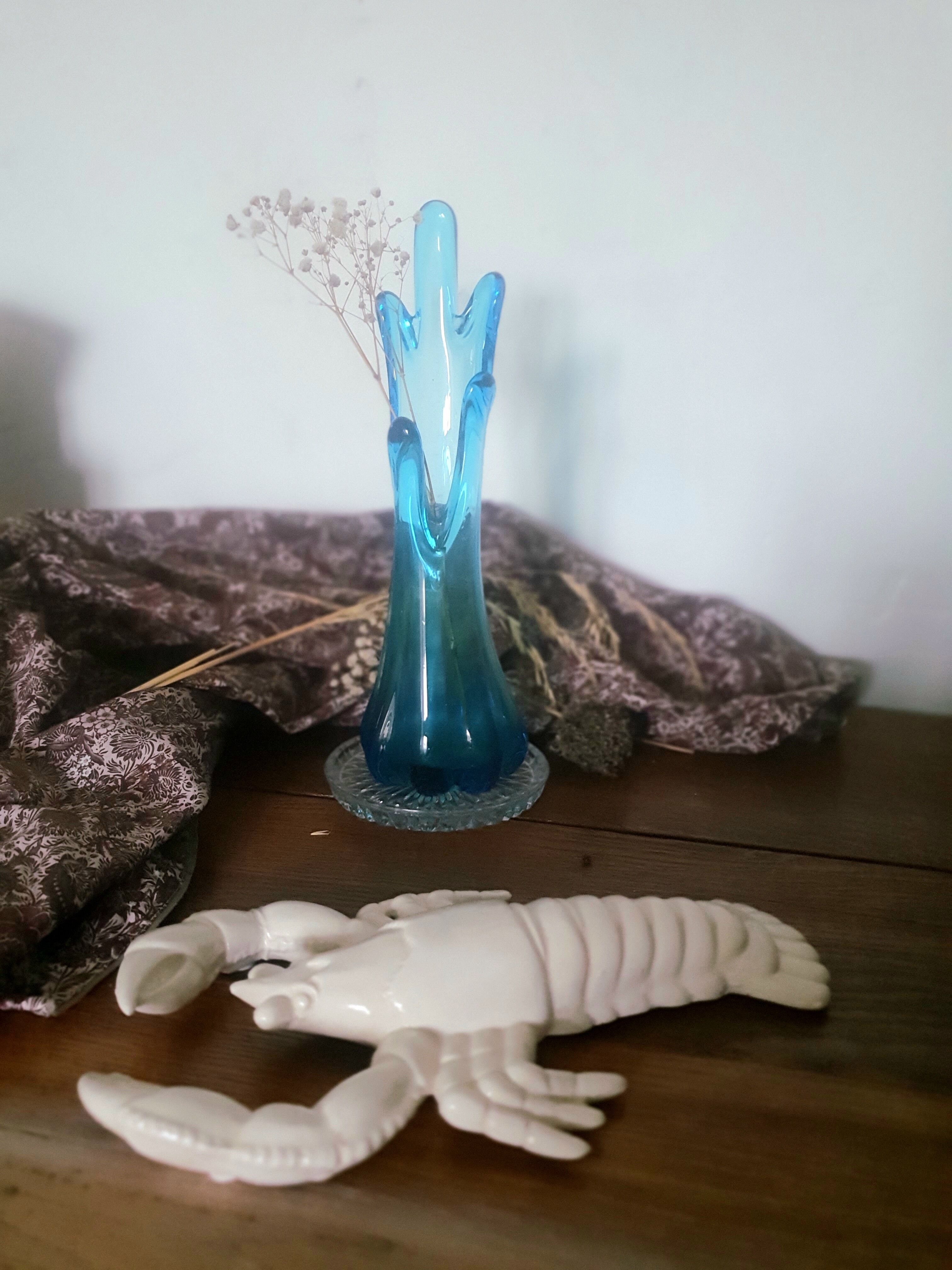 Corolla vase in blue glass