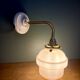 Vintage pink opaline globe wall light.