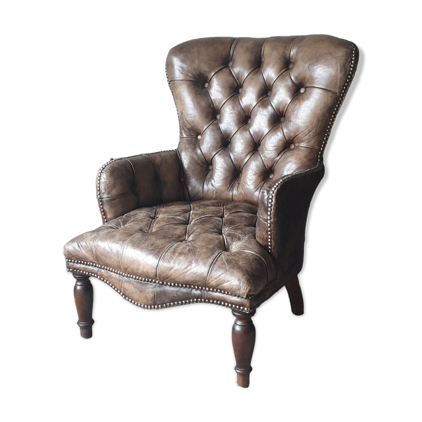 Fauteuil Chesterfield antique