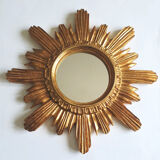 Sun mirror in gilded wood