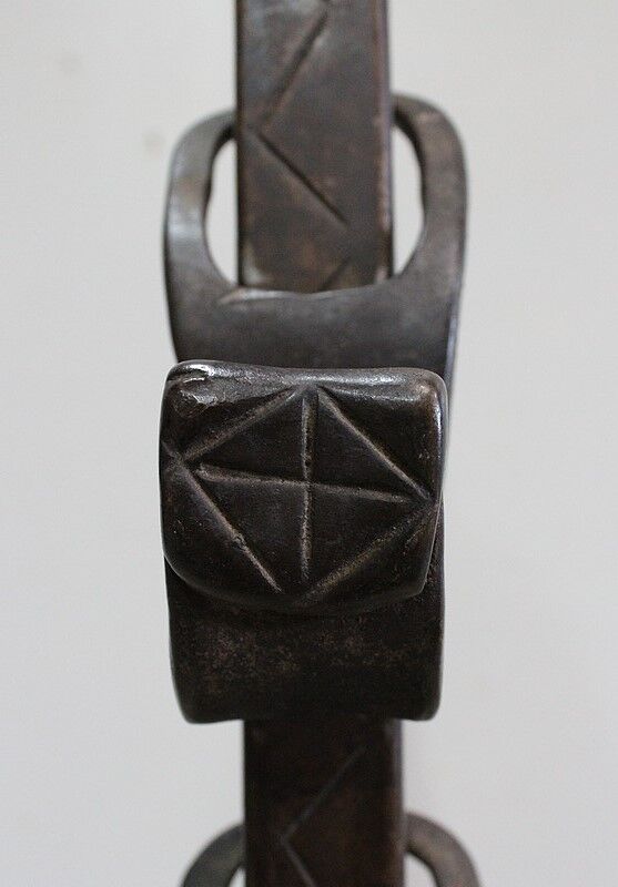 Pair of wrought iron chenets - late nineteenth century