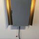 Backlit wall mirror by Floris H. Fidelij