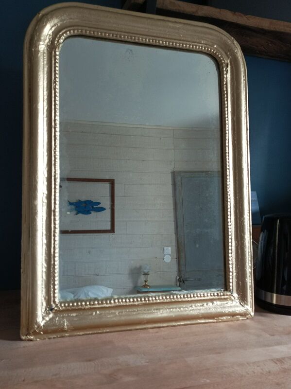 Miroir cadre bois plâtre sculpté perle dorée patiné
