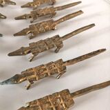 12 vintage bronze knife rests