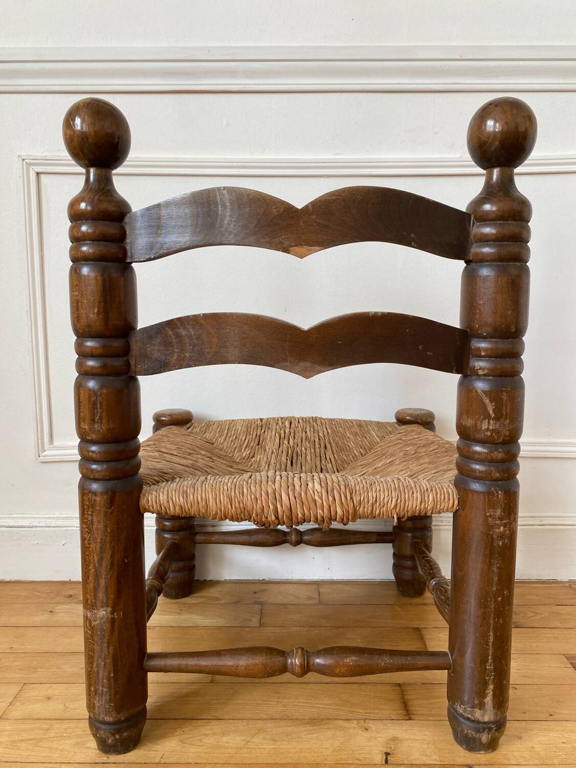 Low fireplace chair in the style of Charles Dudouyt