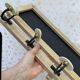Wall-mounted coat rack with porcelain hooks