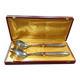Silver-plated salad cutlery in their case.