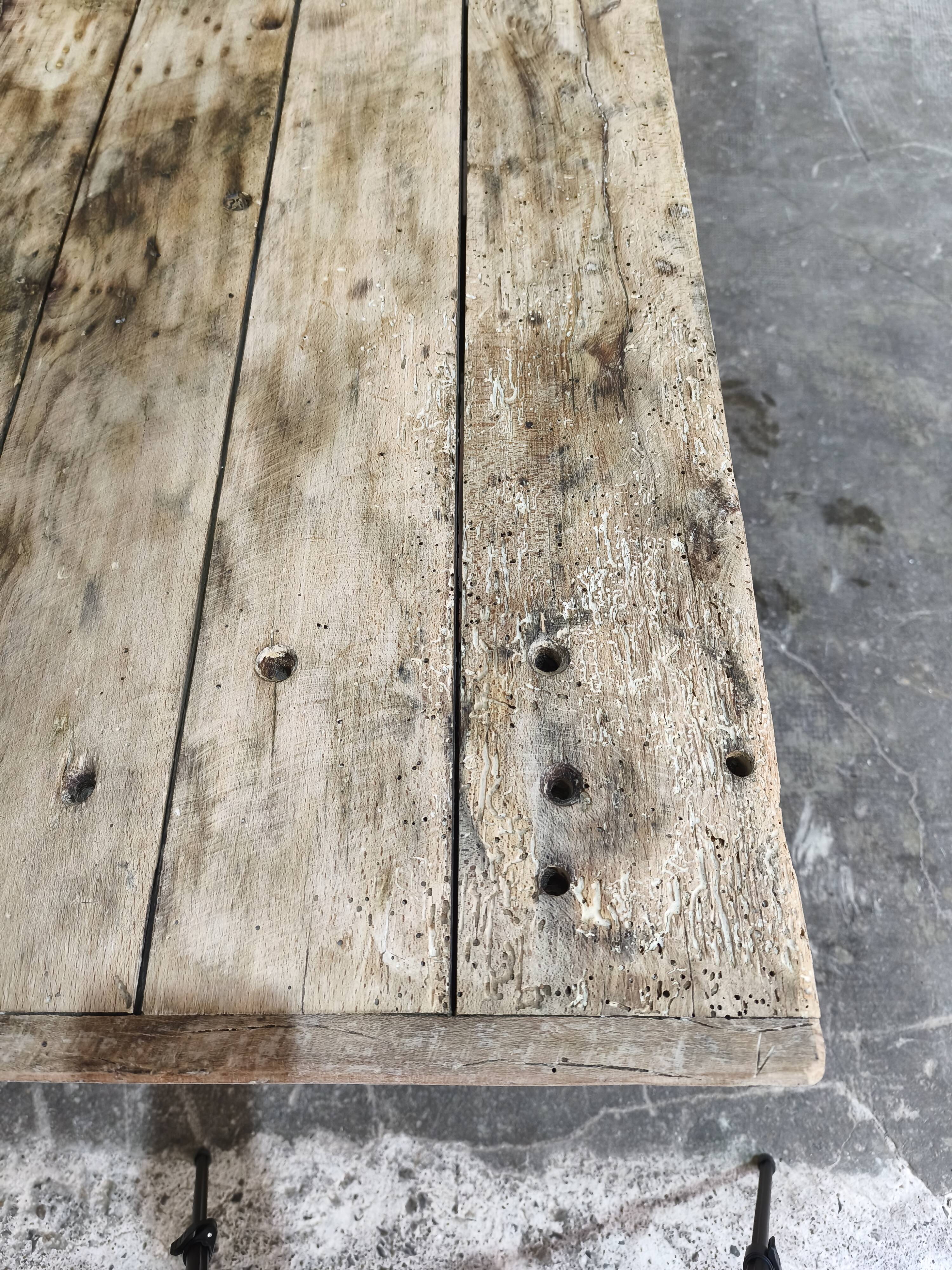 Solid oak coffee table with industrial cast iron legs