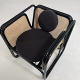 Cubic armchair in black rattan and canework