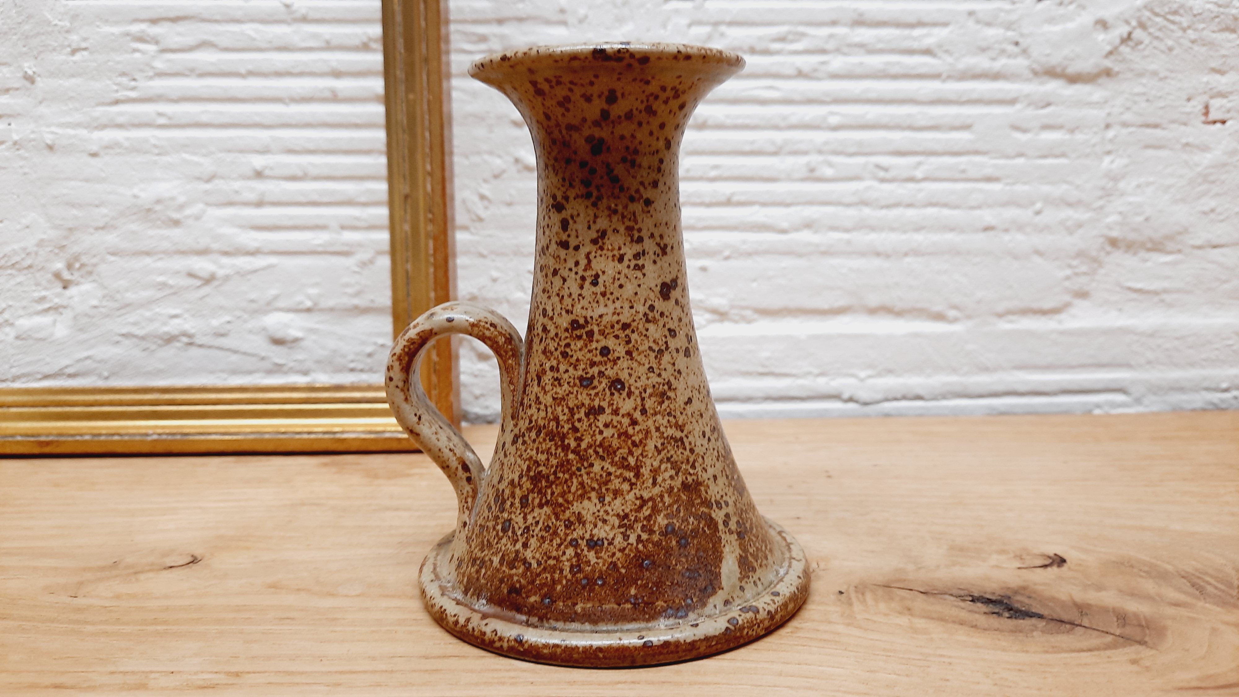Hand candlestick sandstone