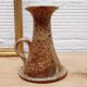 Hand candlestick sandstone