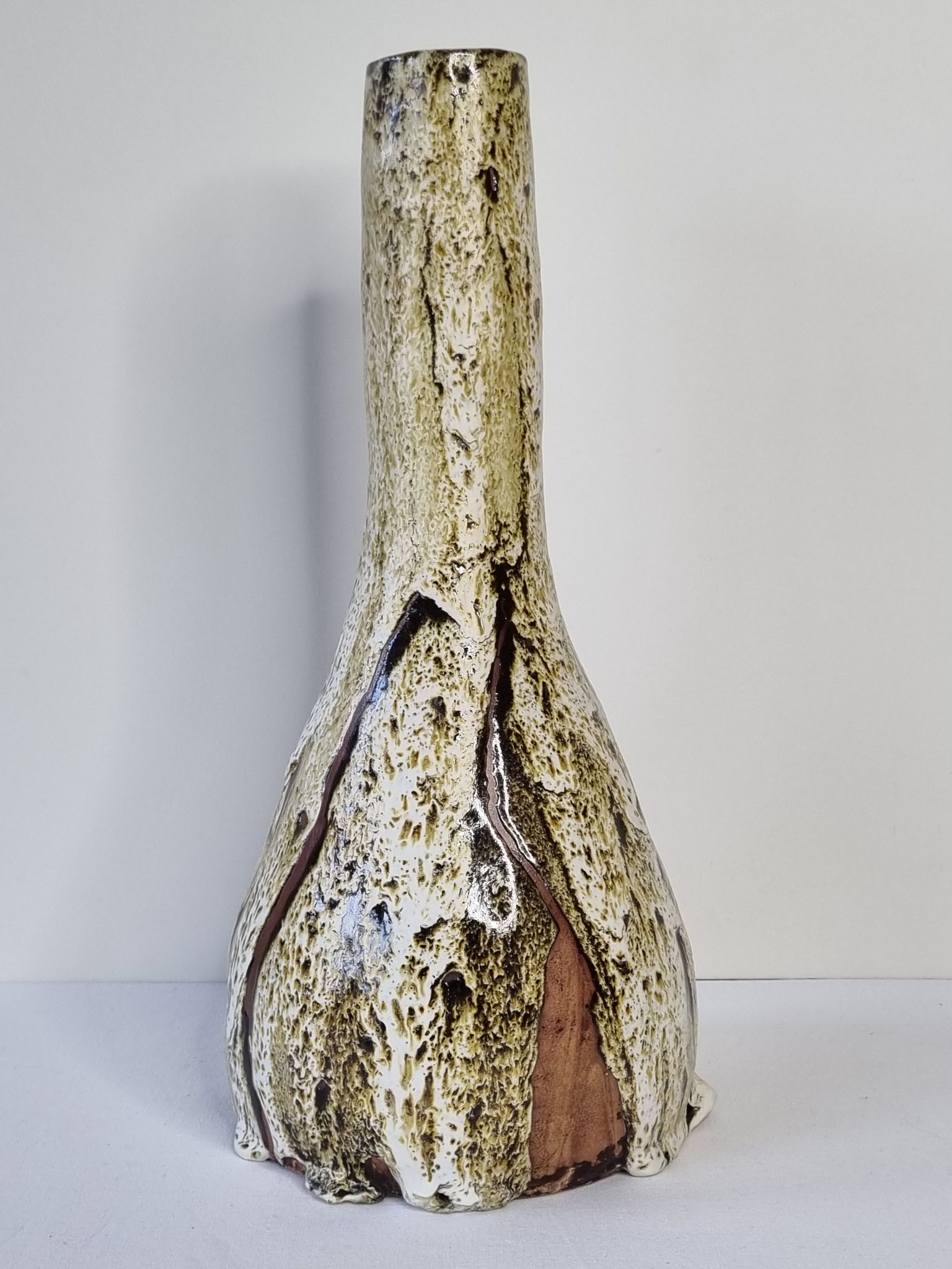 Fat lava glazed ceramic bottle vase