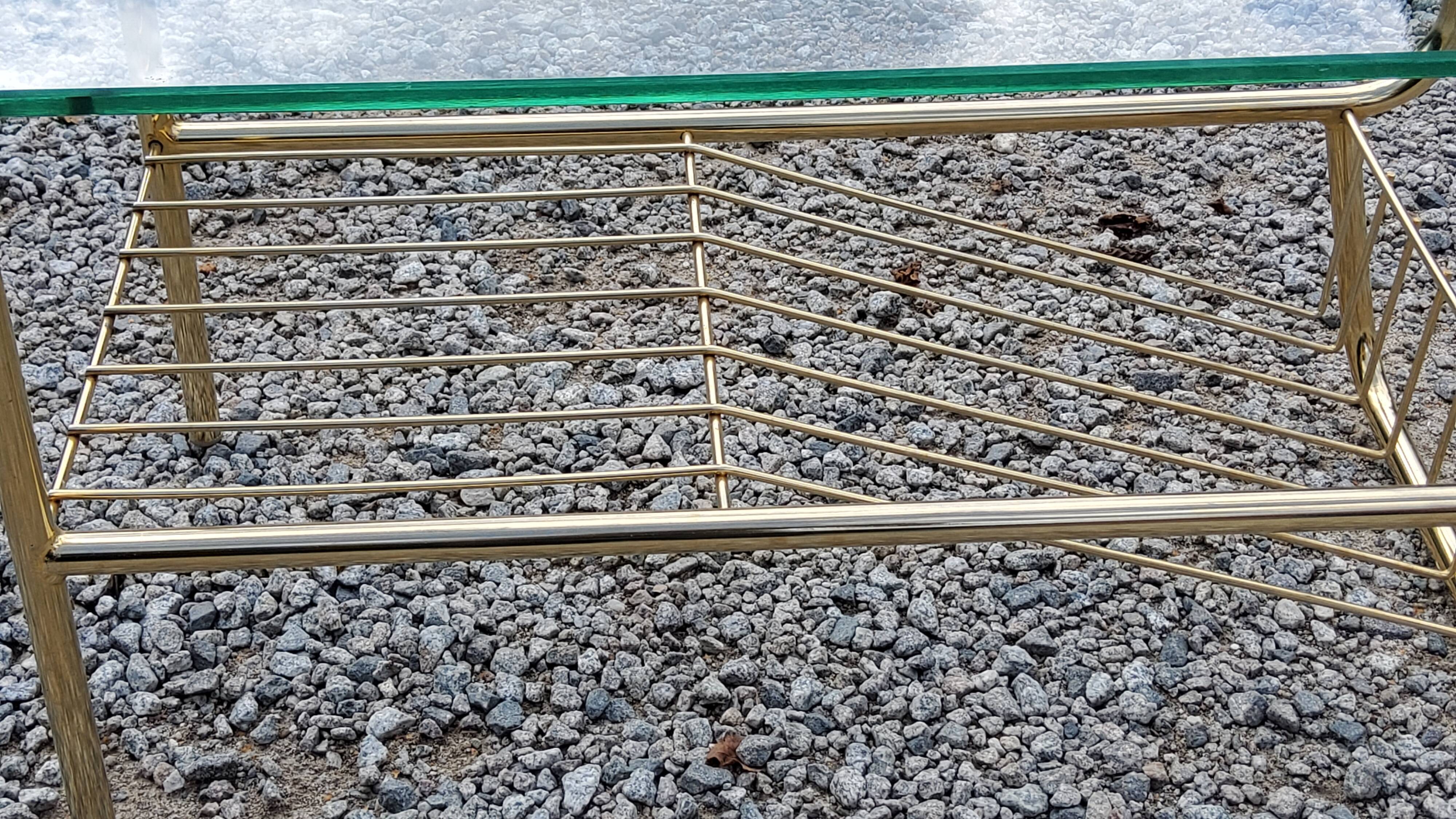 Coffee table from the 60s top glass base metal gilded