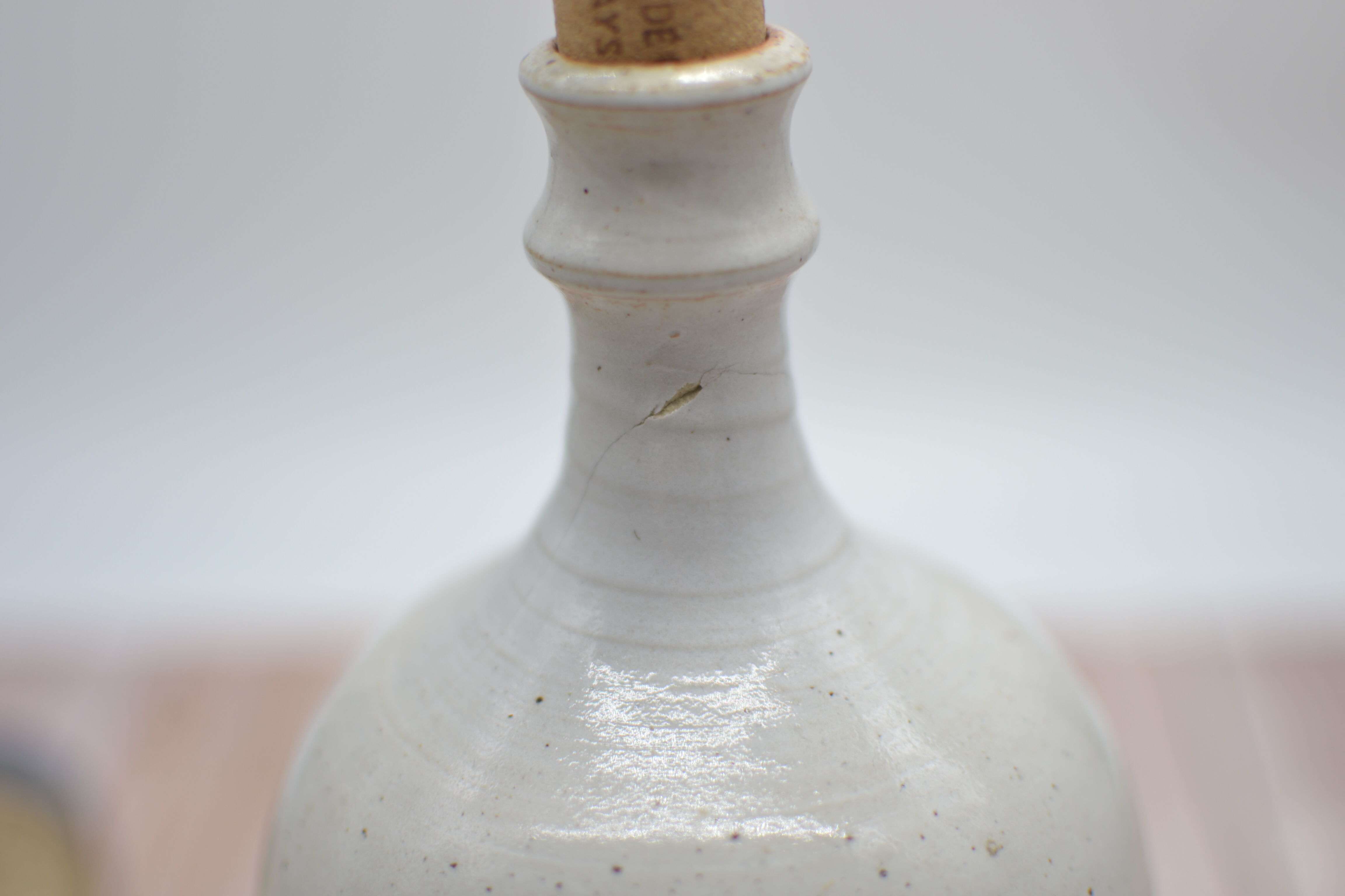 Vintage plum stoneware bottle