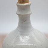 Vintage plum stoneware bottle
