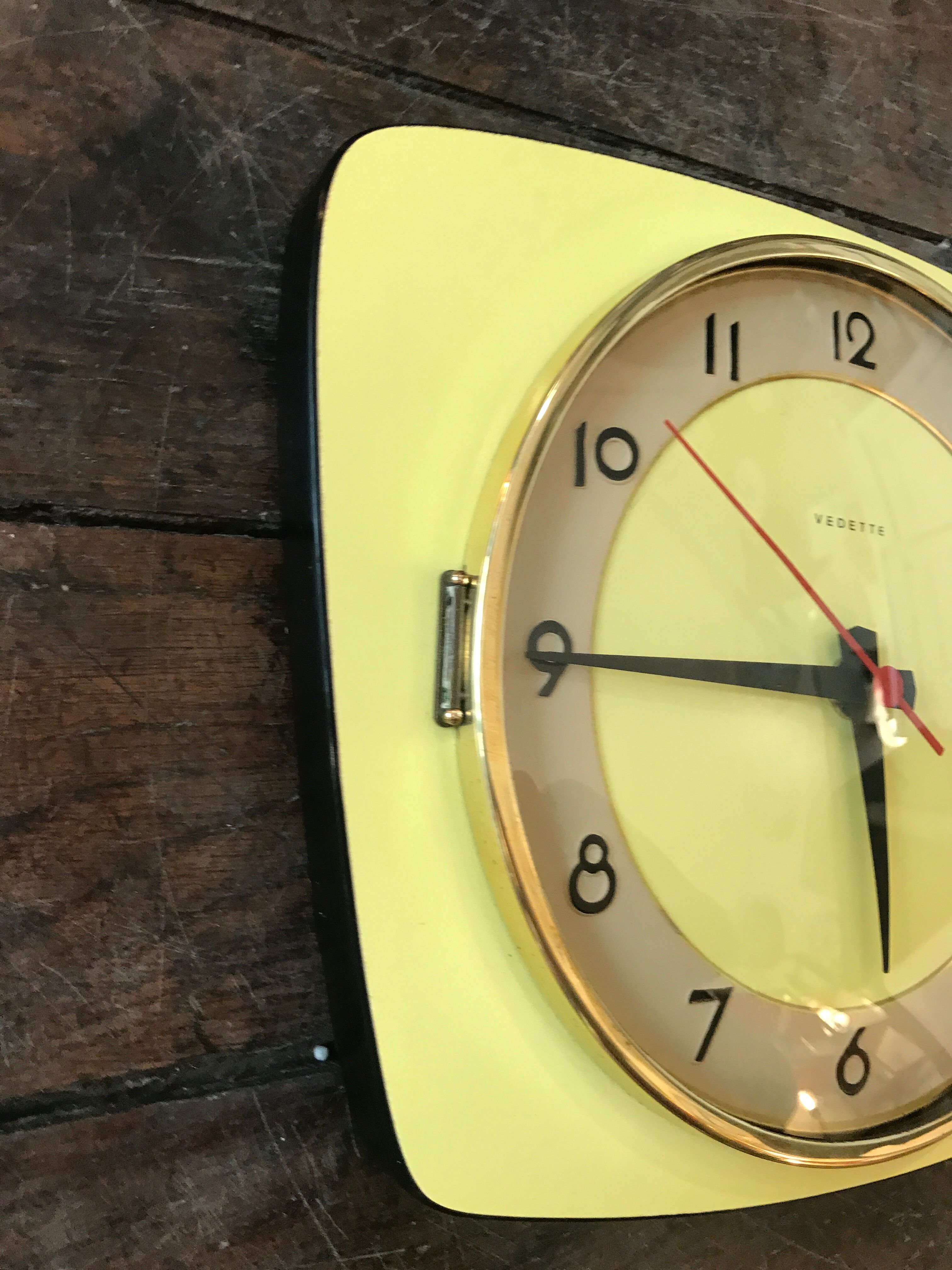 Vintage clock star Formica yellow wall pendulum