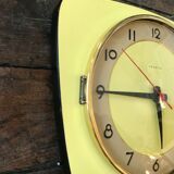 Vintage clock star Formica yellow wall pendulum