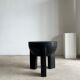 Black mango wood tripod side table with a semi-spherical top, height: 45 cm, diameter: 44 cm.