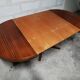Rosewood extendable round table by Luigi Bartolini. vintage dining room 1960/70