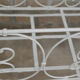 Lit bébé ancien ou banquette en fer forgé