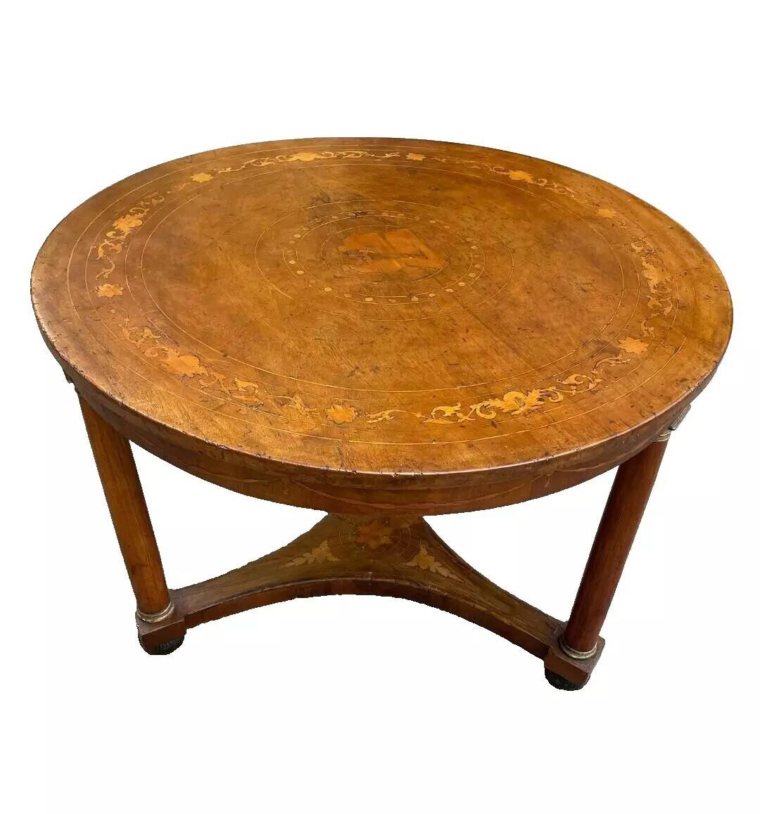Antique round marquetry Empire table from the early 19th century