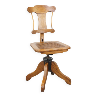 Antique late 19th century English office chair with reclining backrest and height adjustable