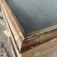 Bedside table and its original patina or small accent piece.