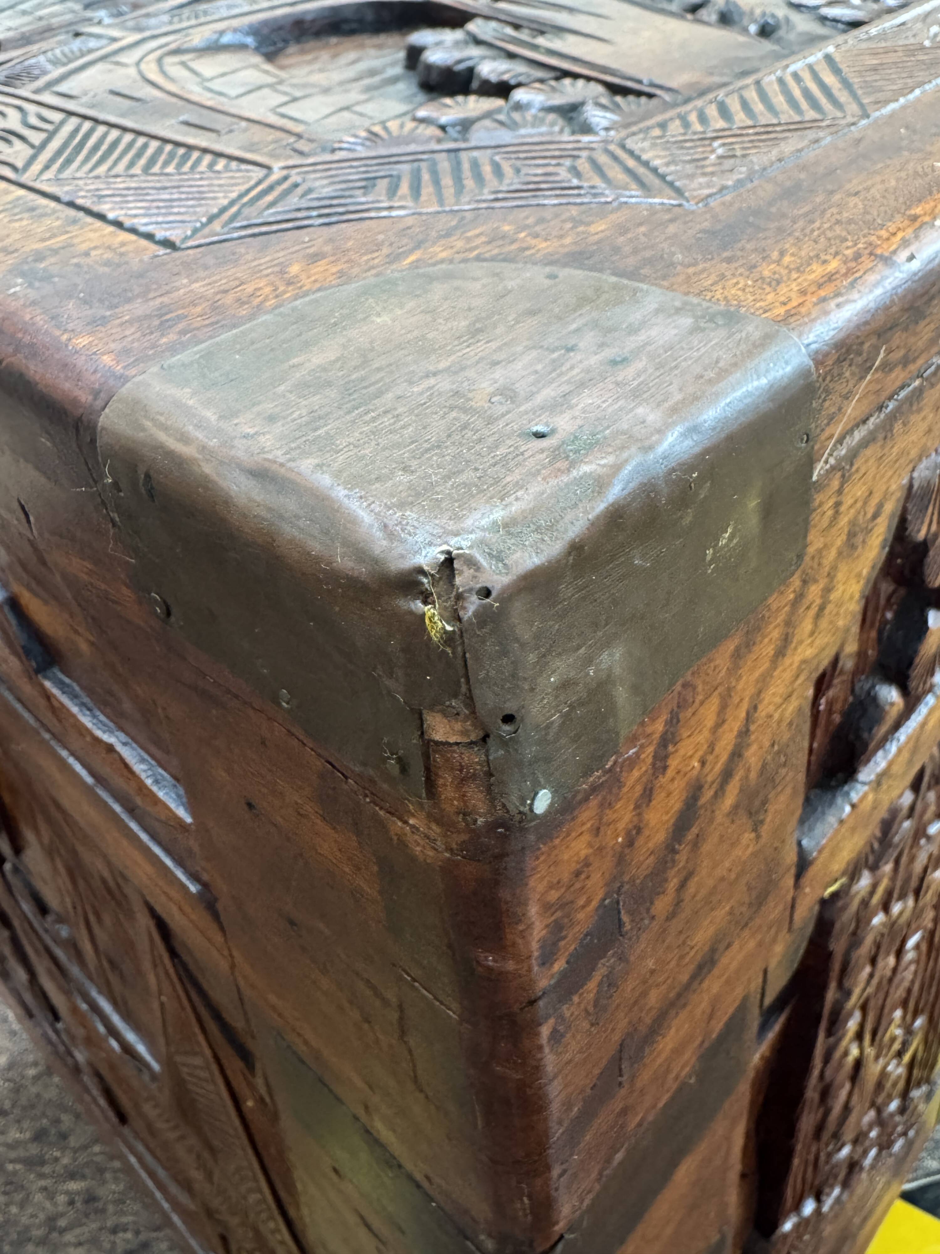 Chinese carved chest made of solid wood — life scenes in bas-relief
