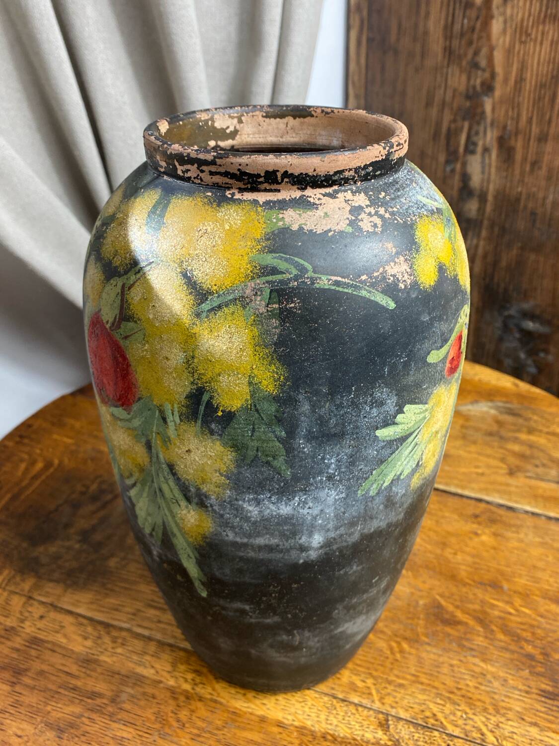 Terracotta vase with floral decoration
