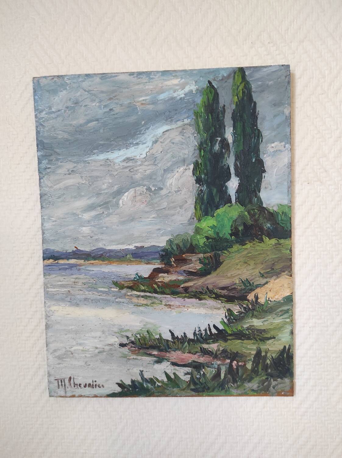 Riverside landscape painting (signed Chevalier)