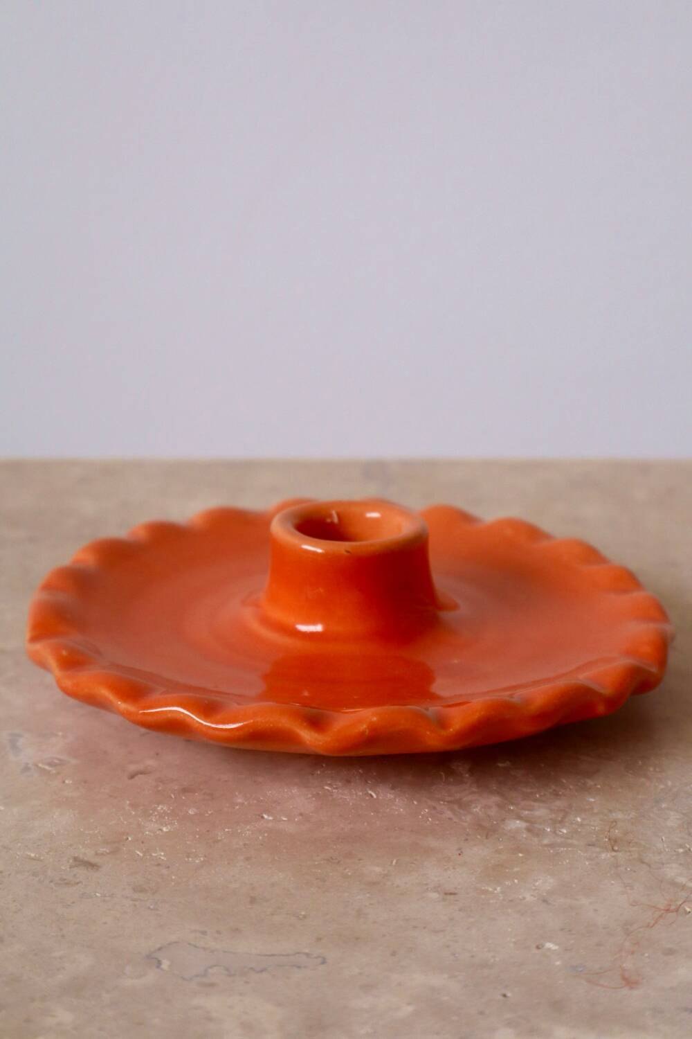Orange ceramic candle holder serrated plate