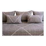 Moroccan pouffe with three cushions