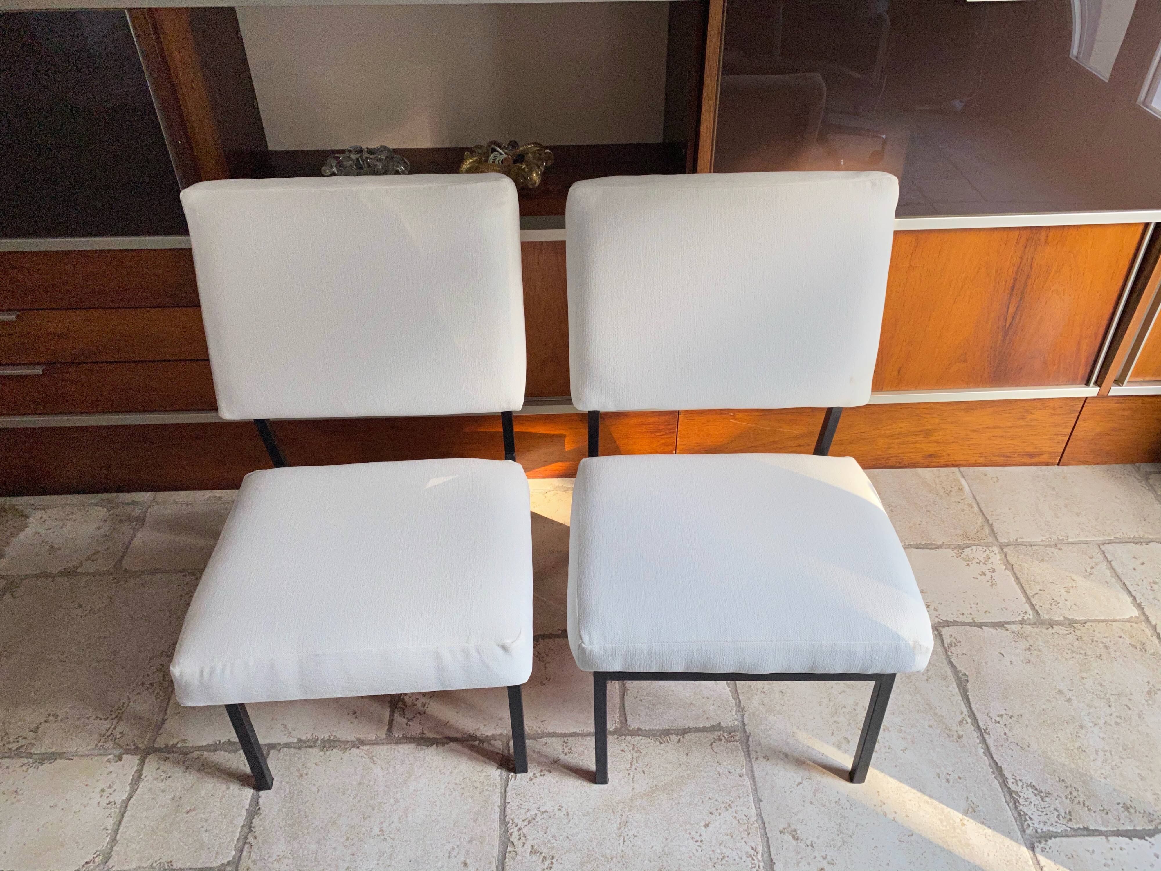 Pair of Paul Geoffroy designer armchairs published by Airborne