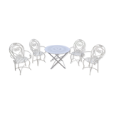 Folding round table and four wrought iron armchairs