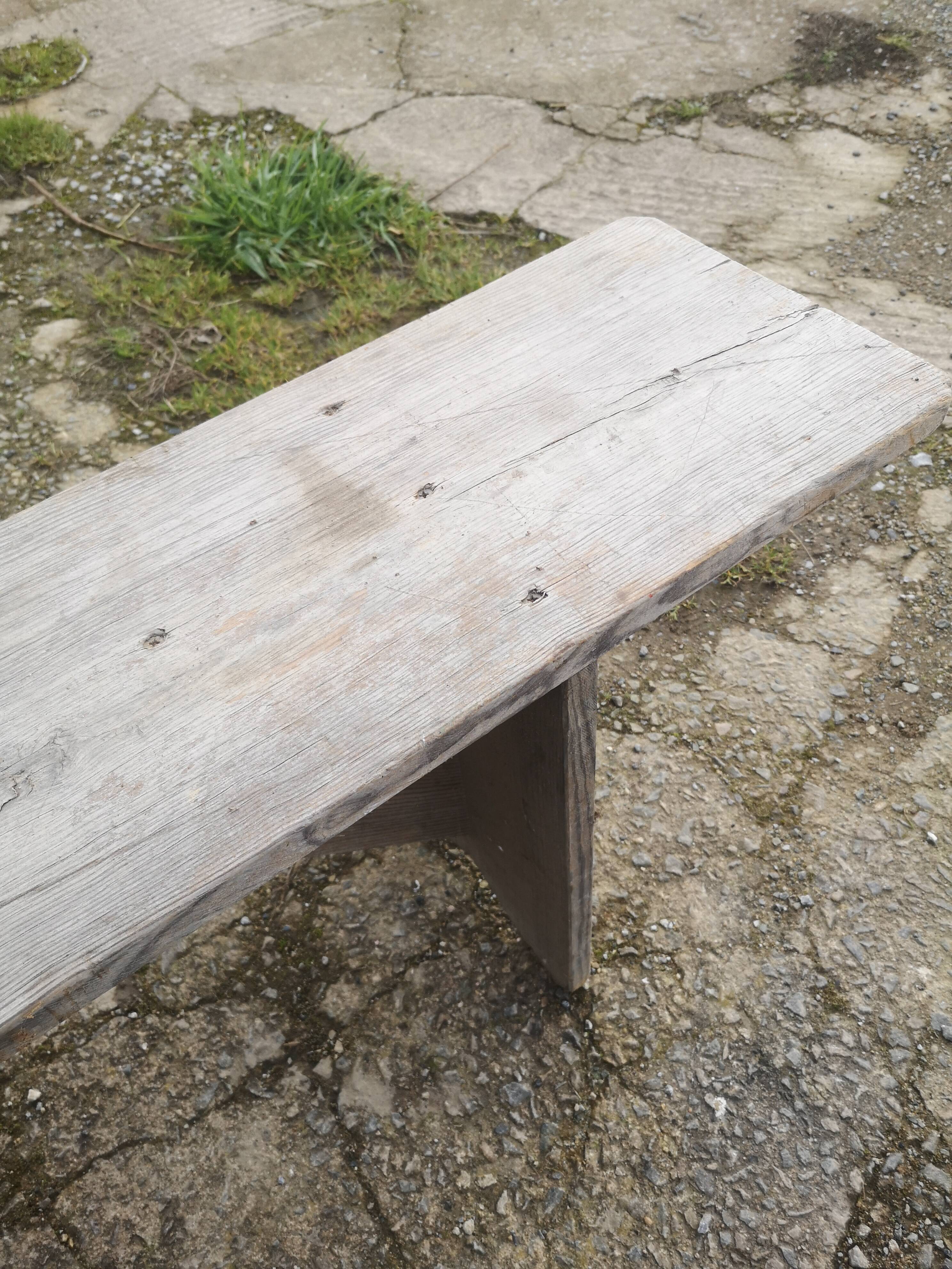 Old wooden farmhouse bench