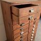 Old apothecary trade furniture in vintage wood 24 drawers.