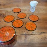 Under a painted wooden frame