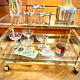 Title: Hollywood Regency chrome & glass side table – 1970s