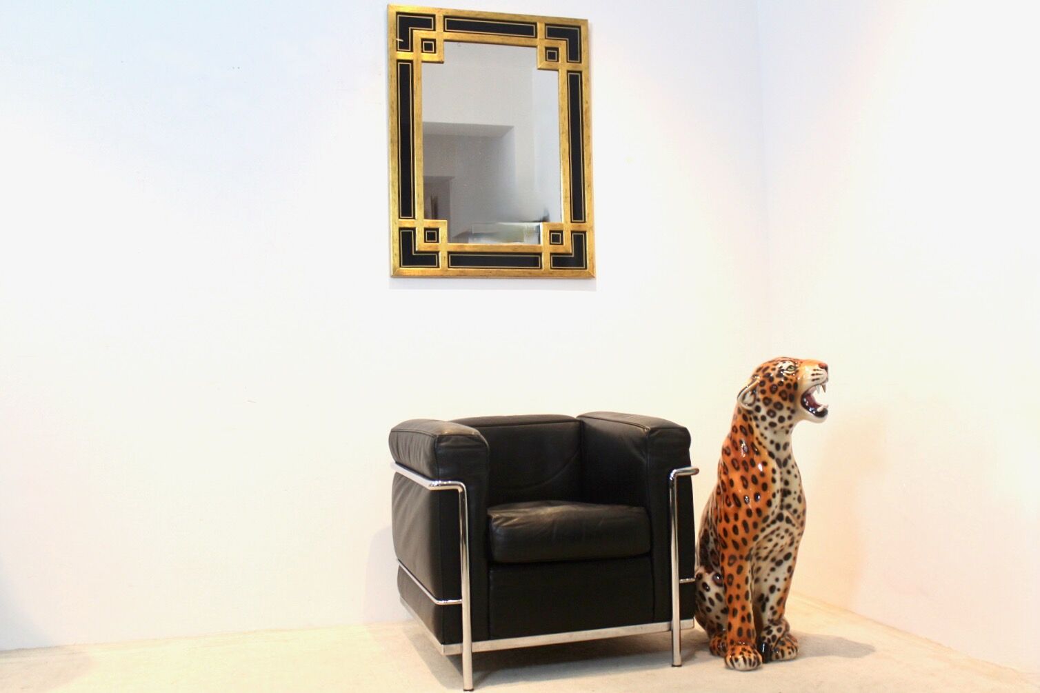 Mirror in gilded wood and black glass by Deknudt Belgium