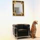 Mirror in gilded wood and black glass by Deknudt Belgium