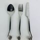 12 couverts "spirales" Jean Dubost en inox, vintage