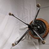 Vintage rotating stool seated in leather and chrome legs