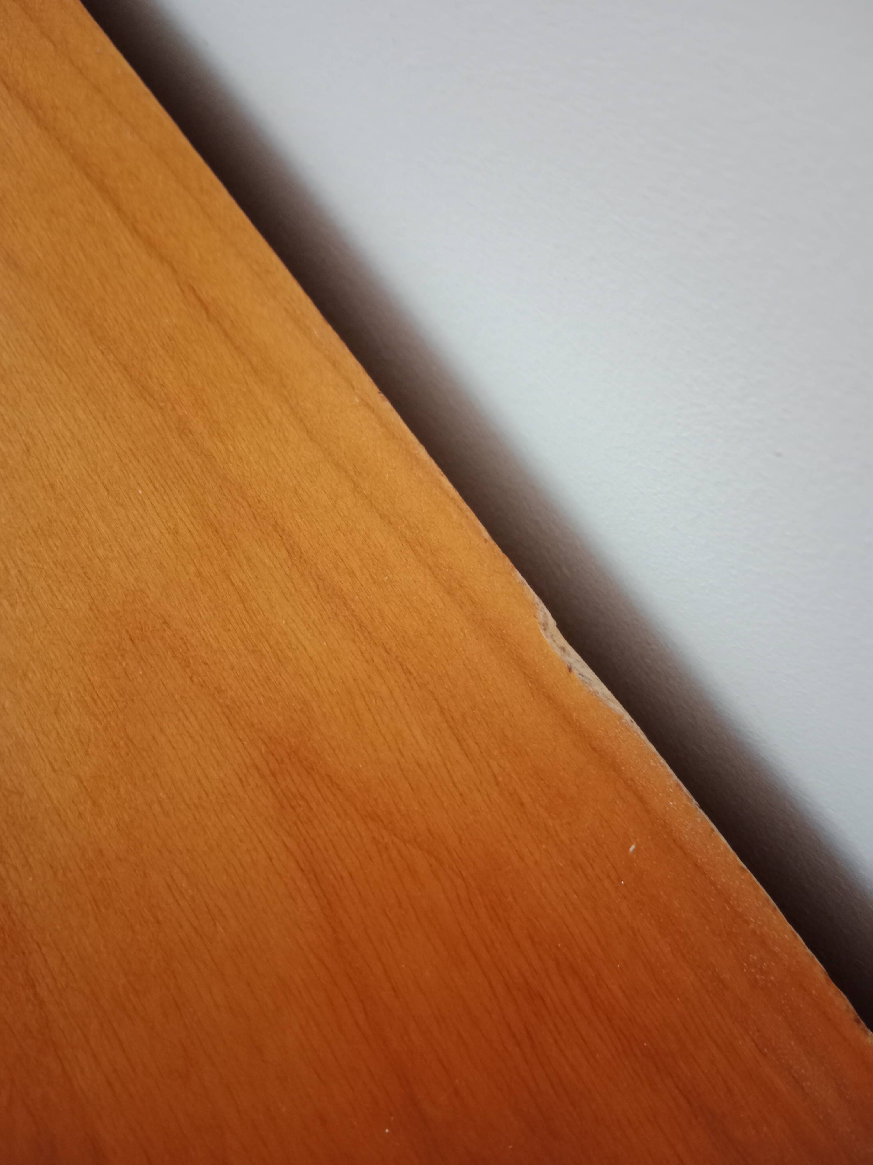 Dark green patina crossbow chest of drawers