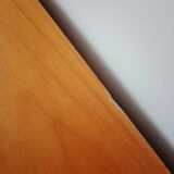 Dark green patina crossbow chest of drawers