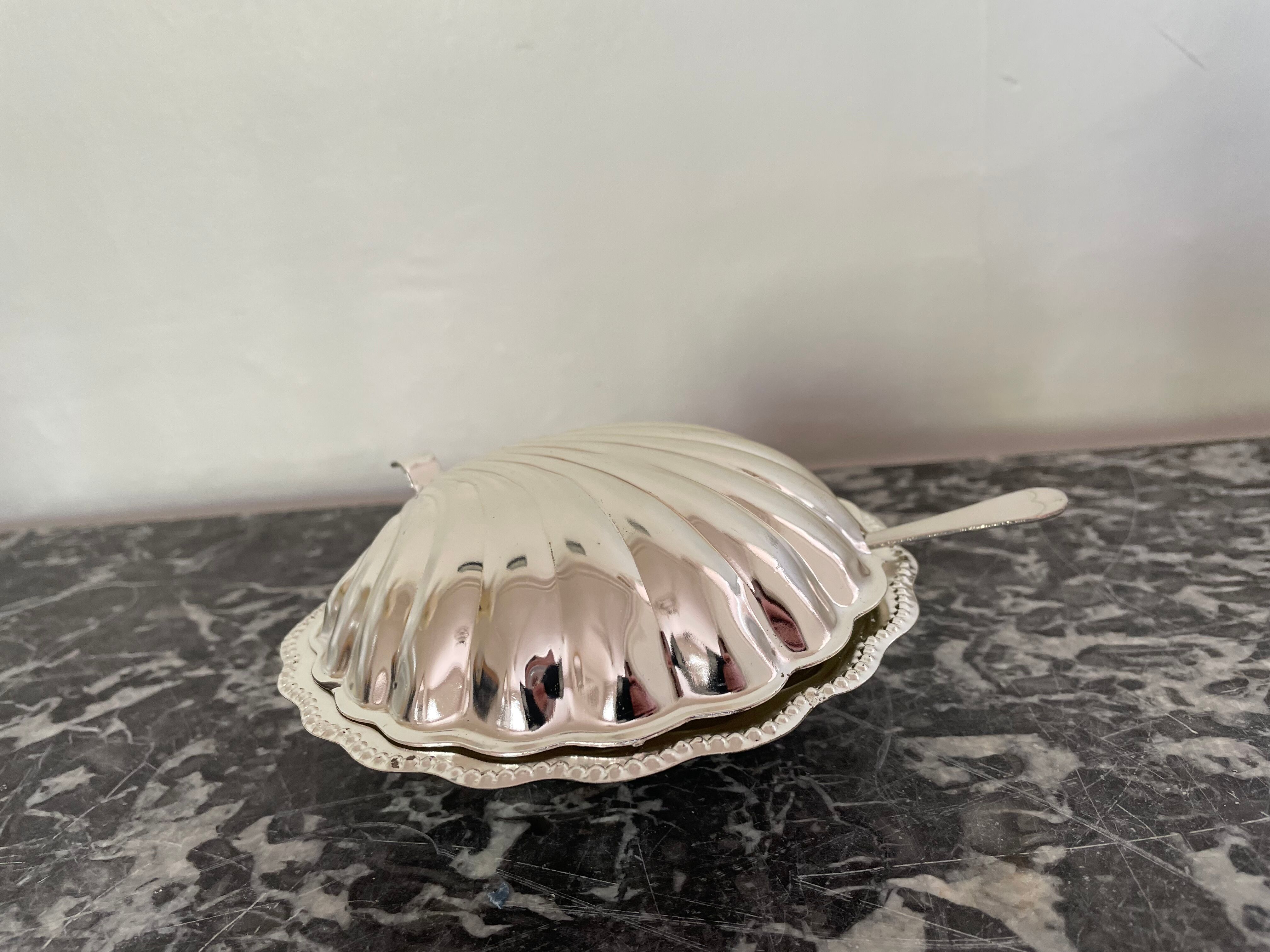 Shell-shaped metal butter dish