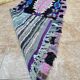 Vintage Berber Boucherouite hallway rug: Handwoven Moroccan rug.