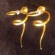 Pair of serpent "teo" lamp wall lights in gold aluminum, enzo ciampalini - 1970s