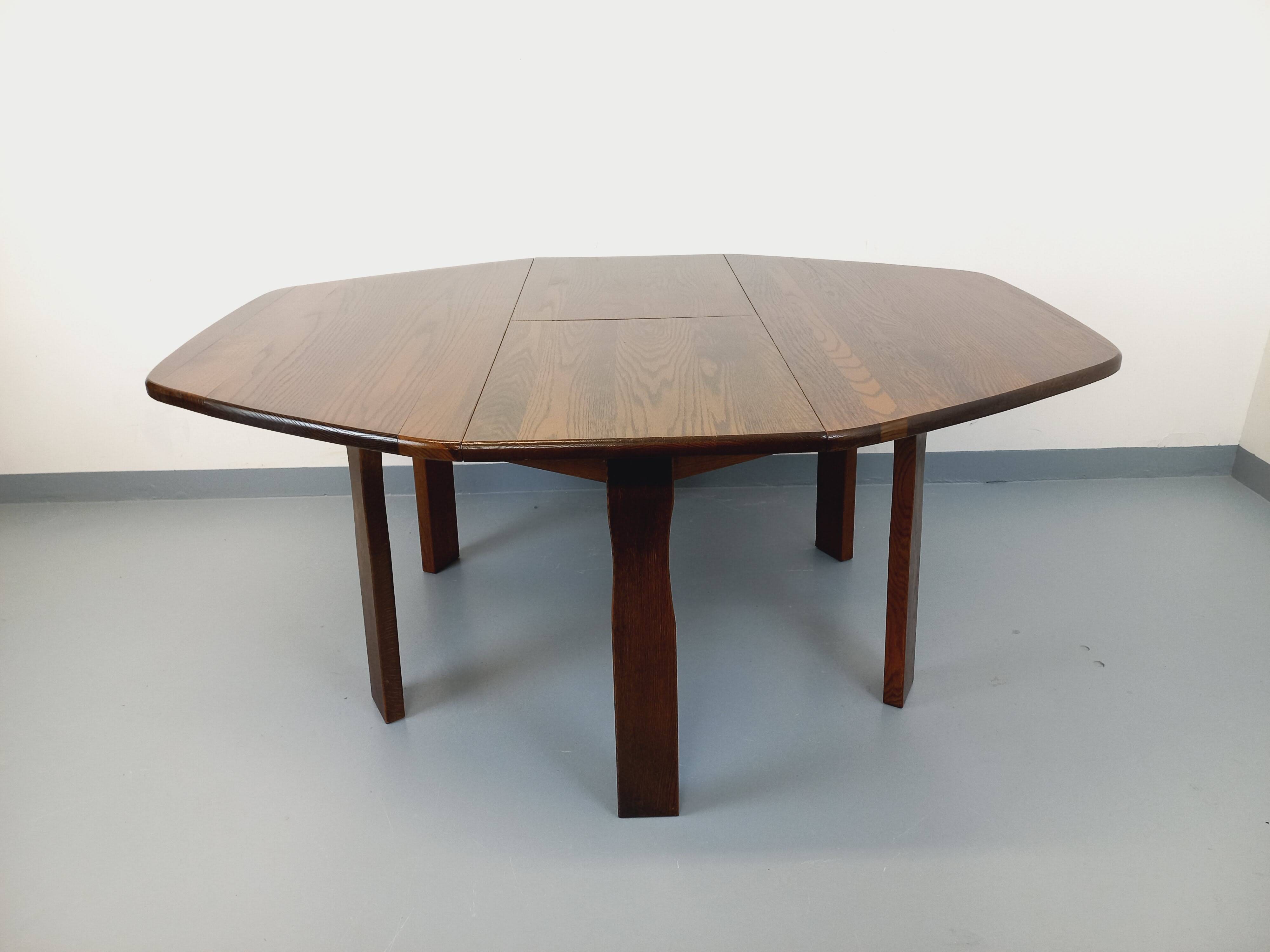 Vintage brutalist hexagonal dining table made of oak from the 1950s.